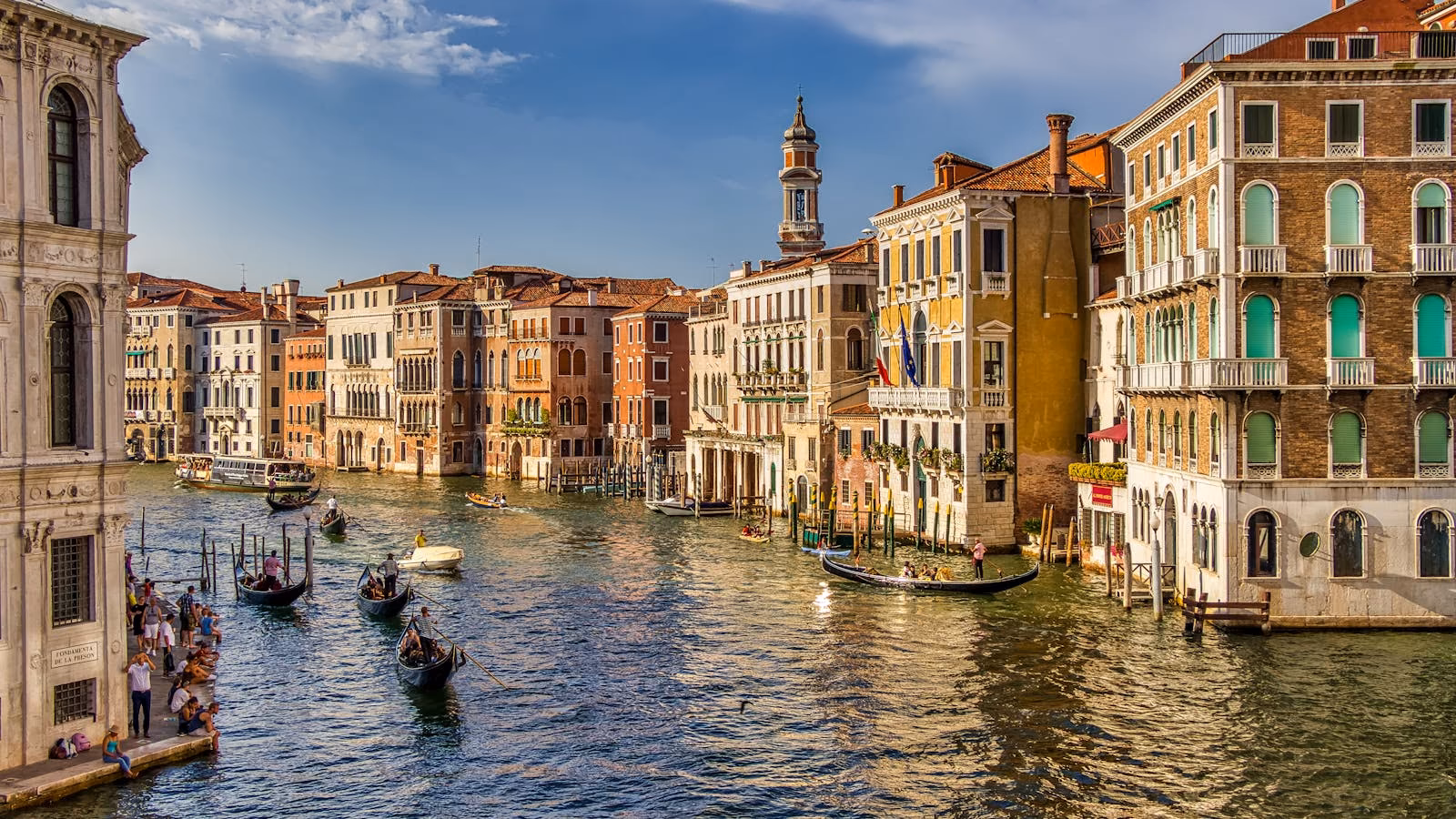 Boats and historic buildings along Venice's Grand Canal