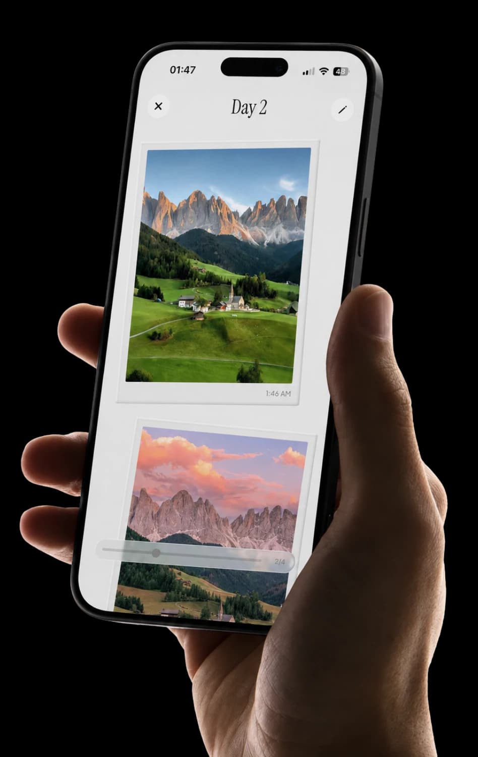 TripMemo TripBook day pages displayed on an iPhone held in hand